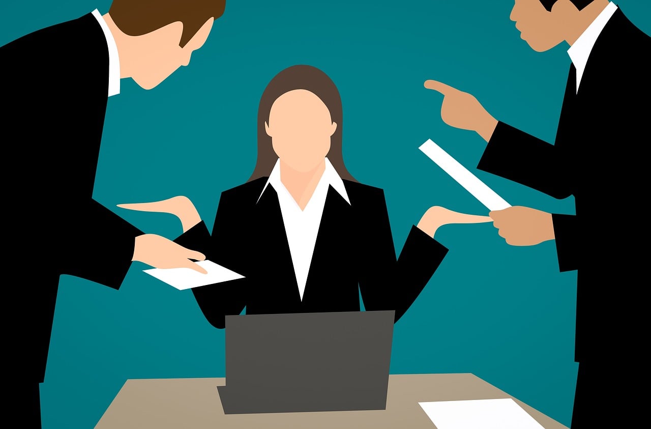 lawyers negotiating with mediator