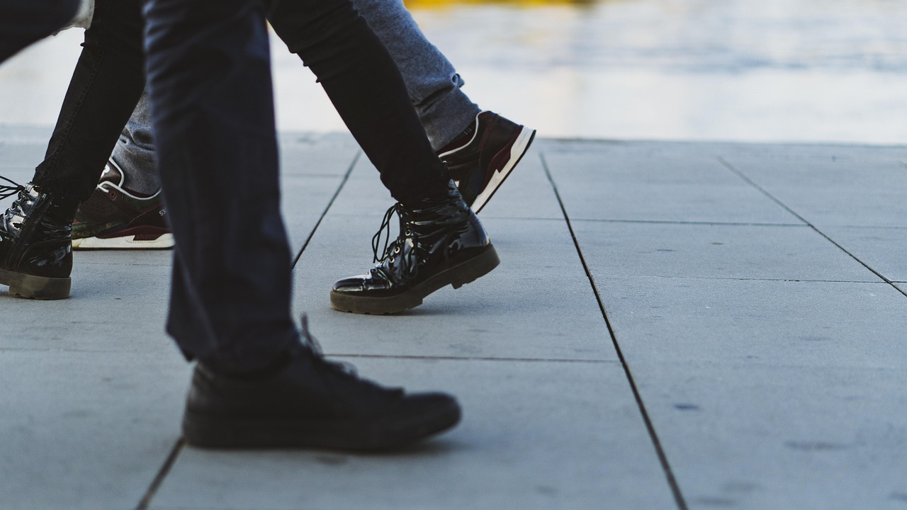 people walking on sidewalk